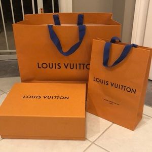 One Louis Vuitton box and two bags